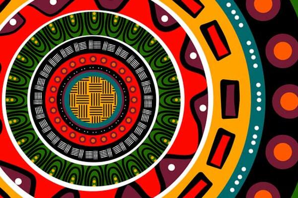 Circular African themed design featuring vibrant colours including red, purples, green and orange