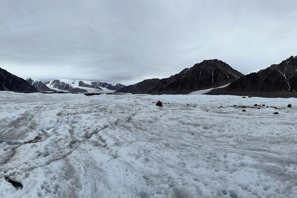 glacier with mountains in the distance