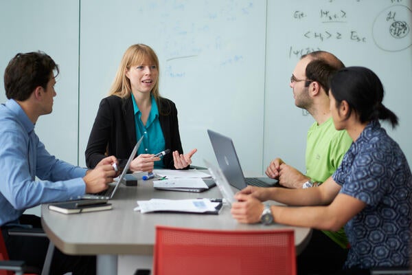 Dr. Christine Muschik with postdoctoral fellows