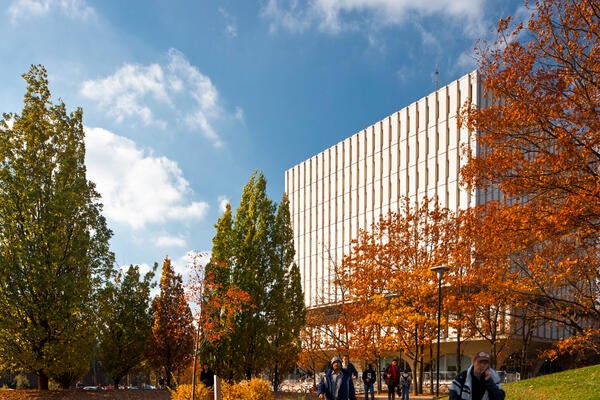 Dana Porter Library in the fall term with students walking in the front