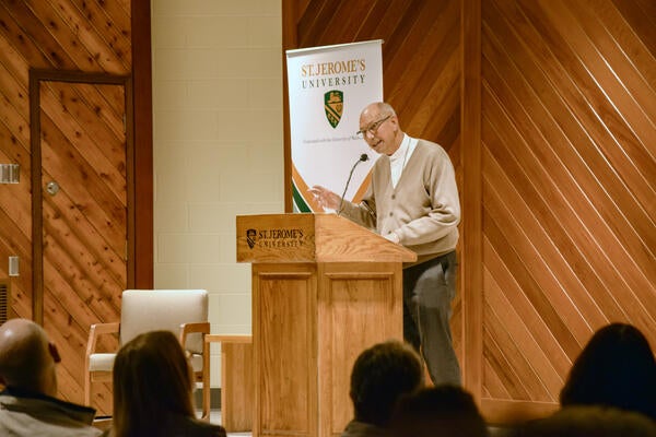 Archbishop Bolen speaking at St Jerome's University