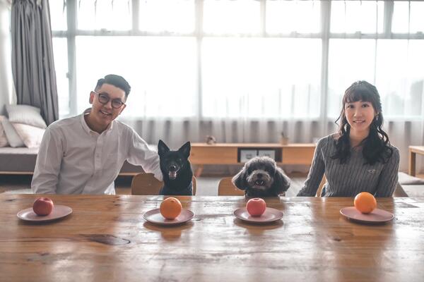 A couple with their dogs.