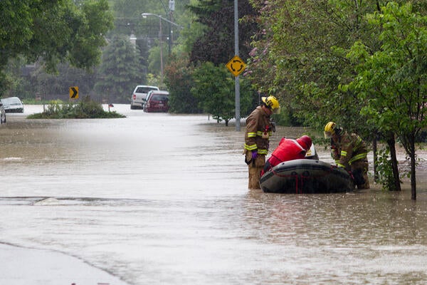 rescuers save people from flood