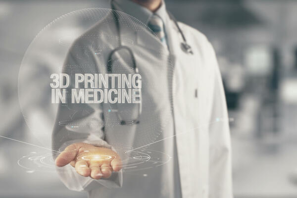 Doctor holding in hand 3D Printing In Medicine 
