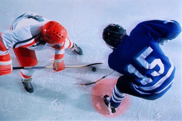 Ice hockey players in face-off