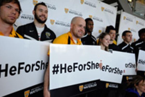 University of Waterloo students holding HeForShe signs