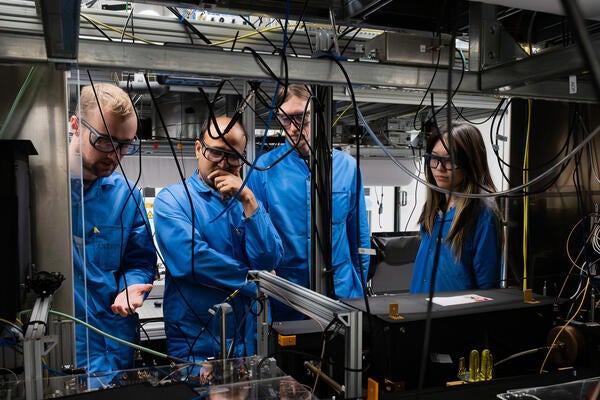 a team of researchers working on a quantum computer