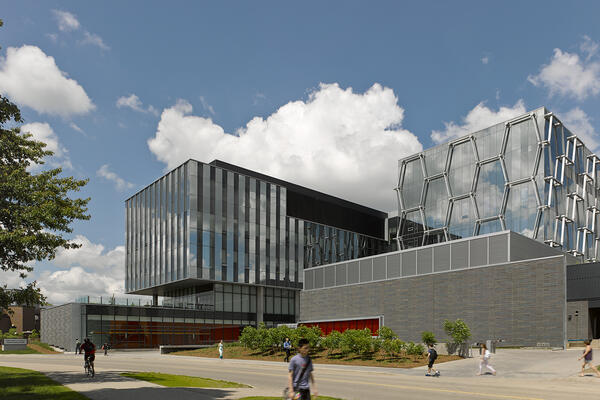 Exterior of the Mike and Ophelia Lazaridis Quantum-Nano Centre in the spring