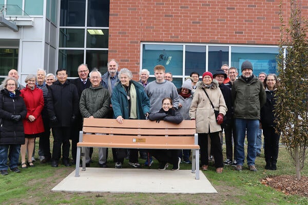 Family and friends of Professor Josef Paldus gather at unveiling of memorial bench and tree at the University of Waterloo. 
