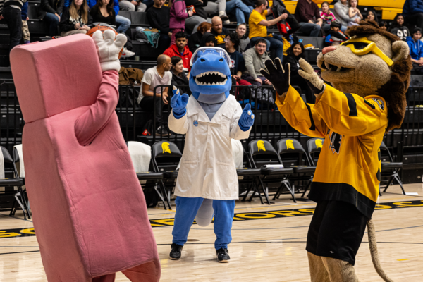 UWaterloo mascots play basketball on the PAC court