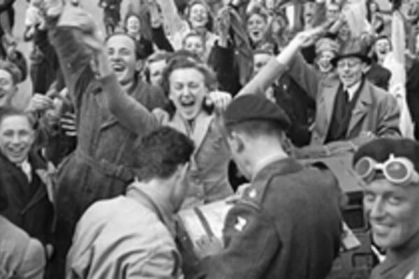 Dutch civilians and Canadian Army troops celebrating the Liberation