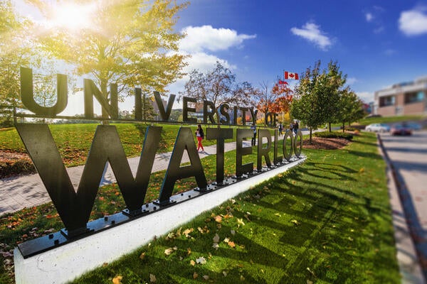 University of Waterloo sign on a sunny fall day