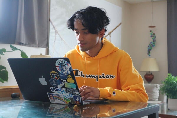Student at desk on computer