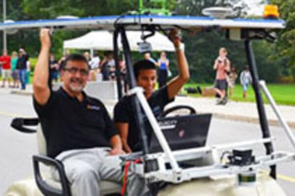 President Hamdullahpur rides in the self-driving car