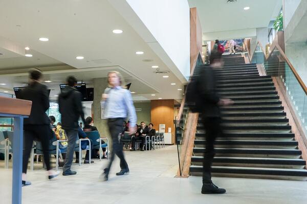 University students walking through a building For many students, university is an exciting way to propel their career whether i