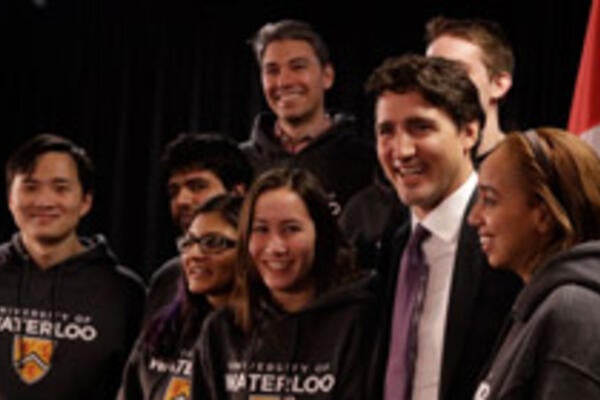 Justin Trudeau poses with a group of Waterloo students