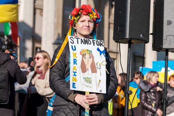 A woman protests the war in Ukraine.