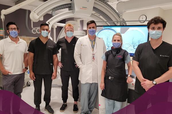 Michael Phillips of Vena Medical, third from left, poses with a medical team at the London Health Sciences Centre in London.
