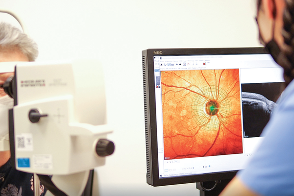 Eye test and monitor showing eye in detail