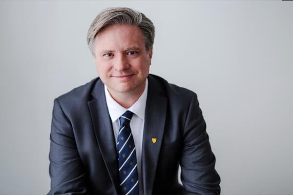 Dr. Bill Rosehart sitting down