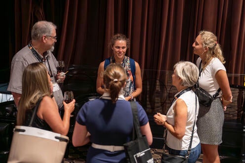 A group of attendees networking during the reception. 