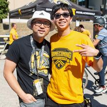 Guests pose together in their Waterloo gear