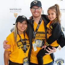 A family poses in their Waterloo gear