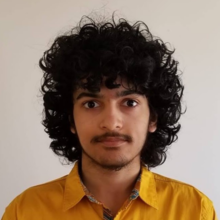 Profile photo of Saptarshi in a yellow shirt