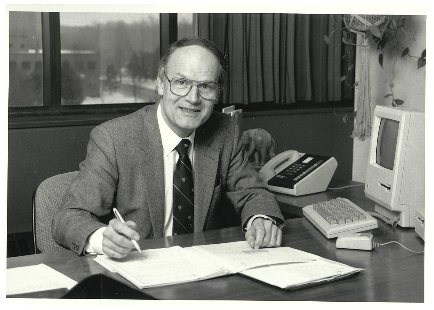 Thomas Bzrustowski working behind his desk