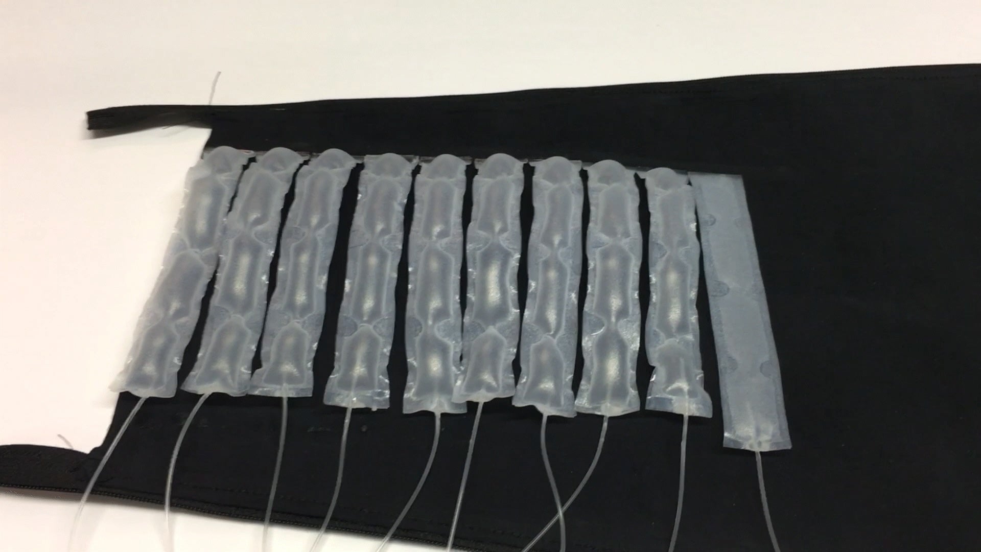 Inflatable chambers gently expanding and contracting to provide therapeutic compression for patients managing lymphedema.