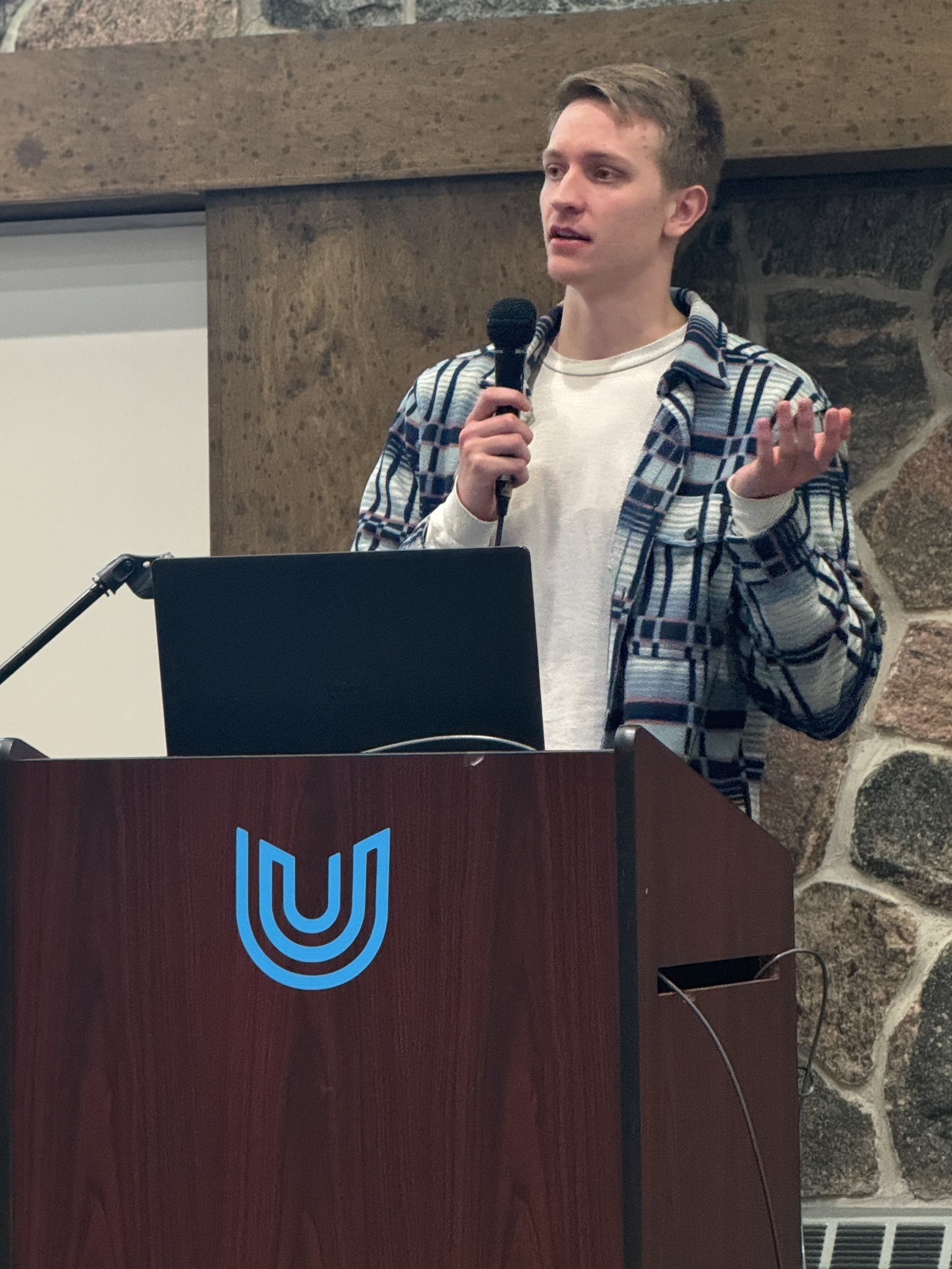 Josiah Plett presenting at the 31st Social Impact Showcase