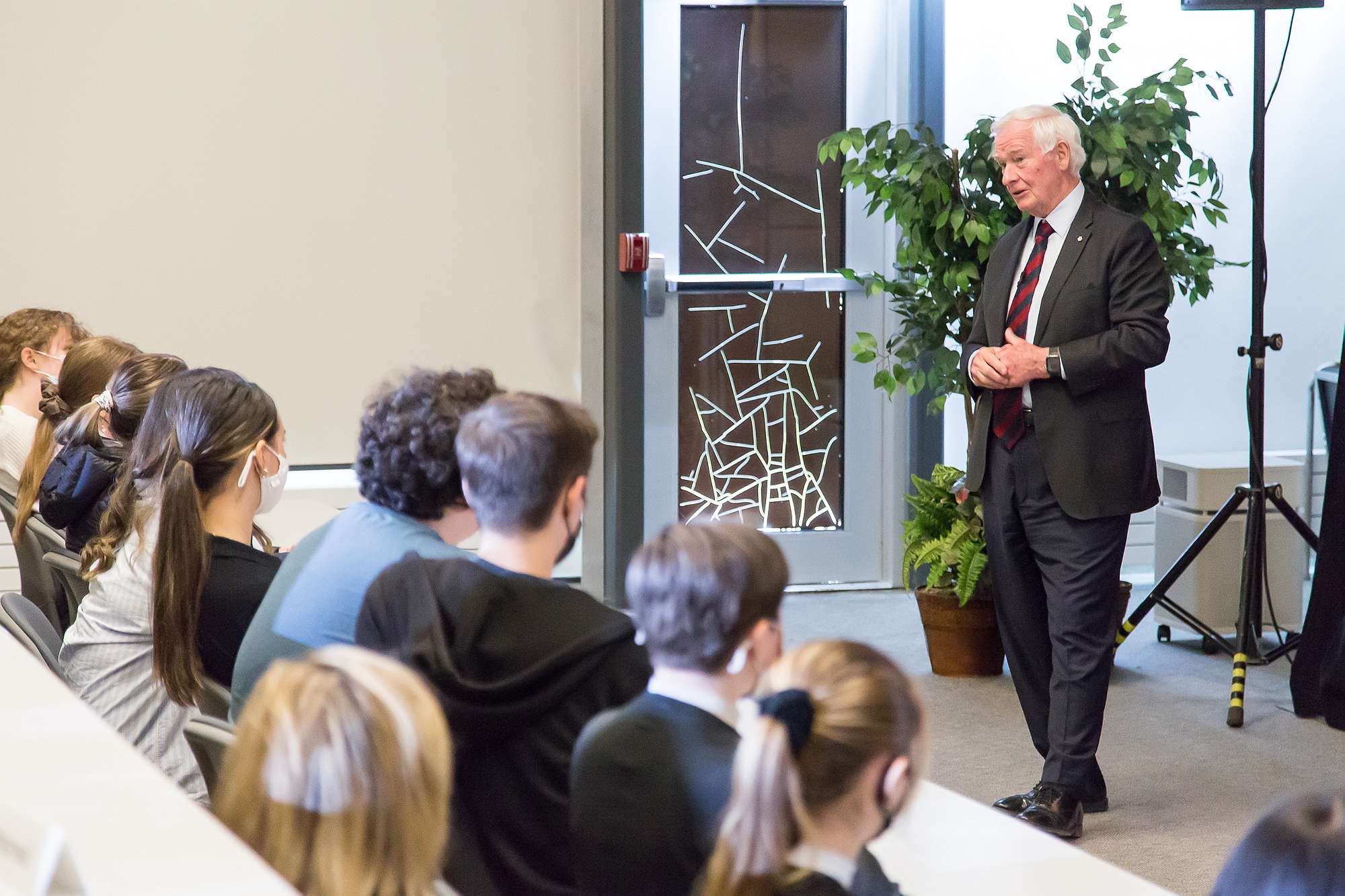 Johnston addresses questions from local high school students. 