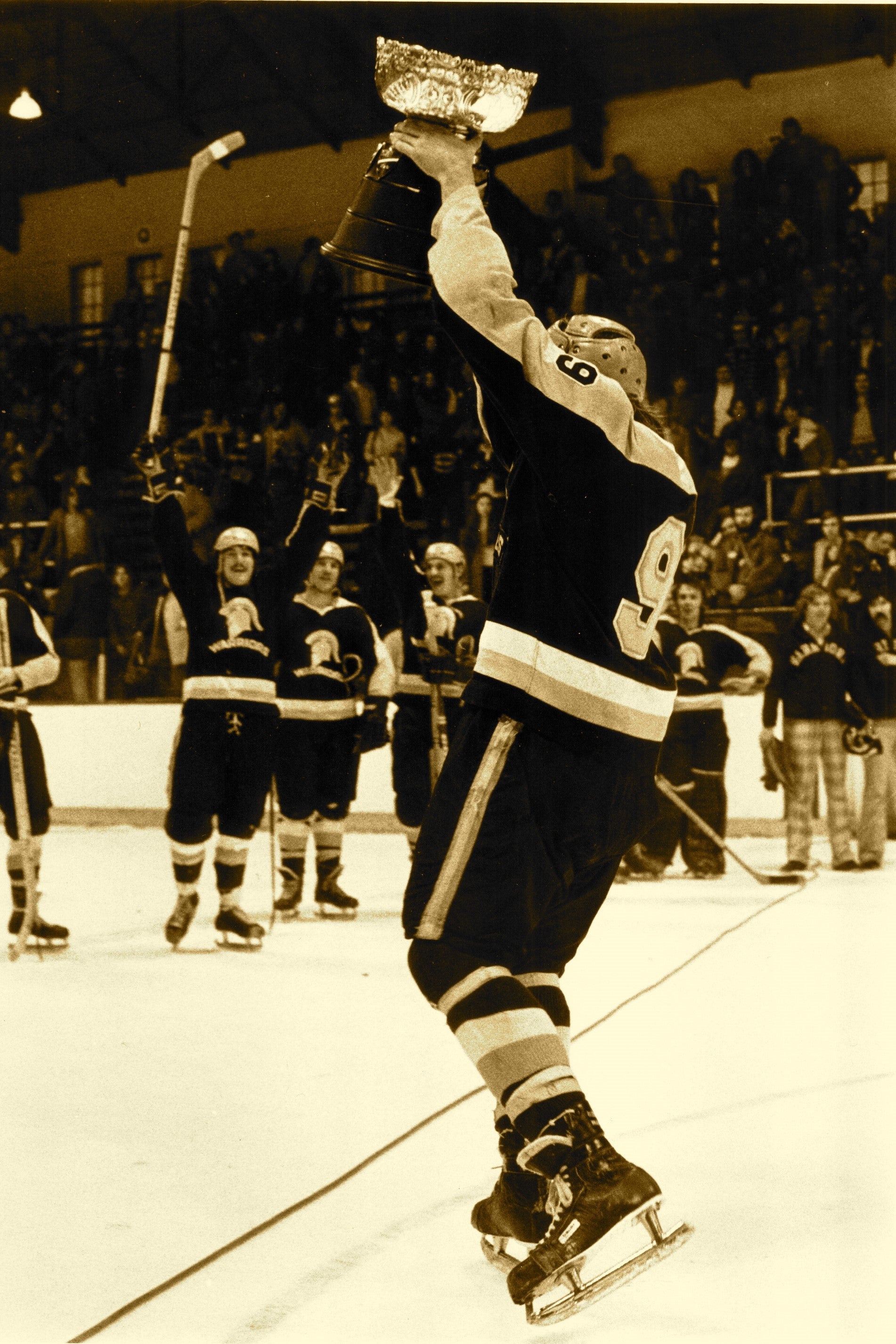 Hockey player with trophy