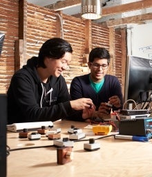 Two employees in a workshop
