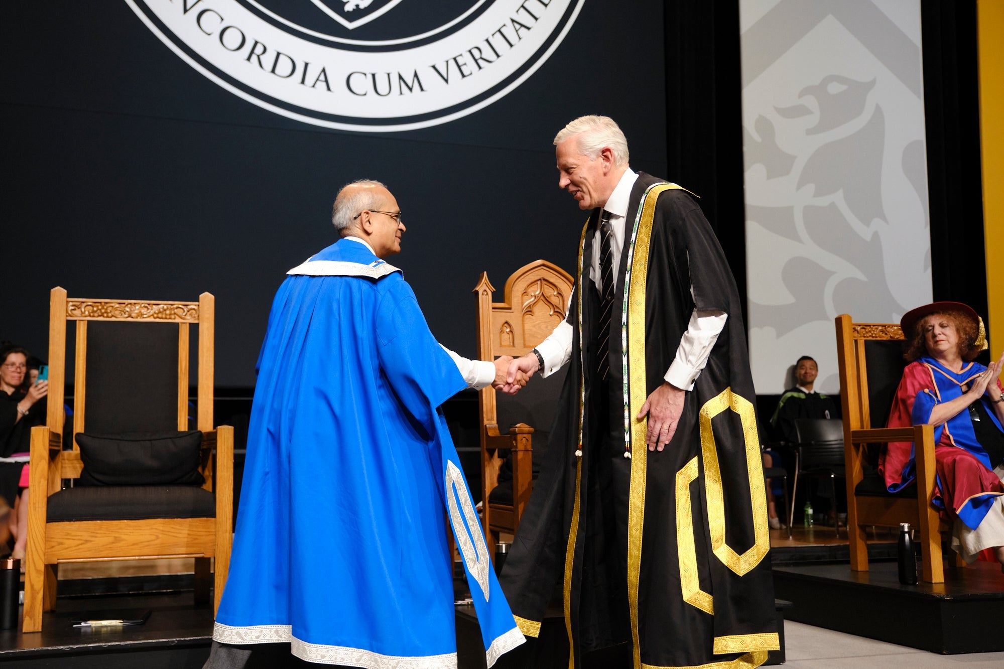 Waterloo's chancellor Dominic Barton (right) and president Vivek Goel (left)