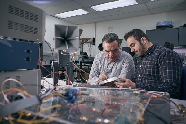 Amir Kandani working in the lab