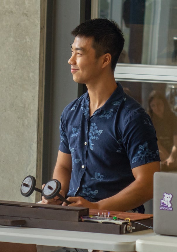 Nicholas Sia demonstrates his team's gamelan