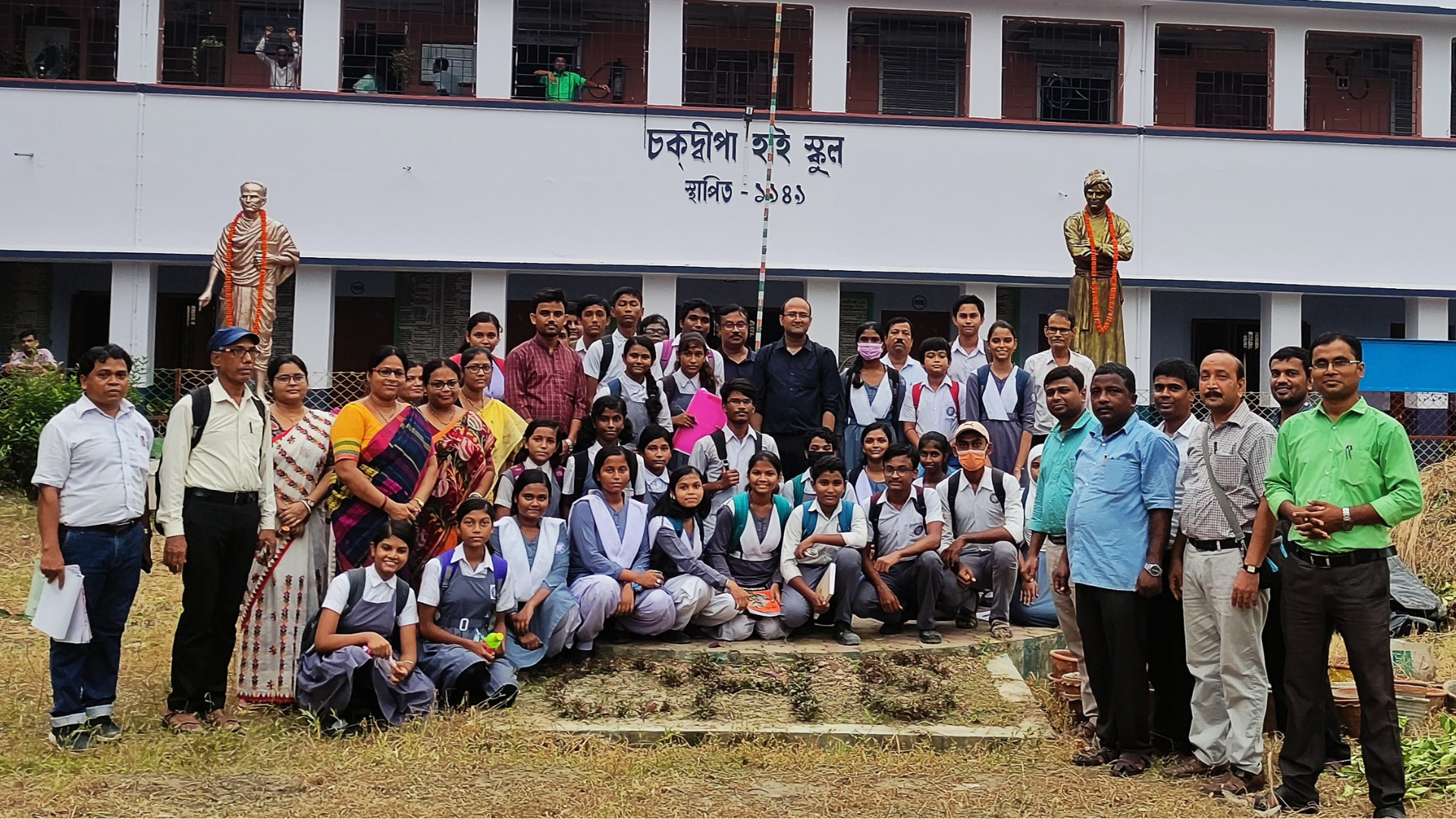Rajibul Islam with students outside of an elementary school in West Bengal, India.
