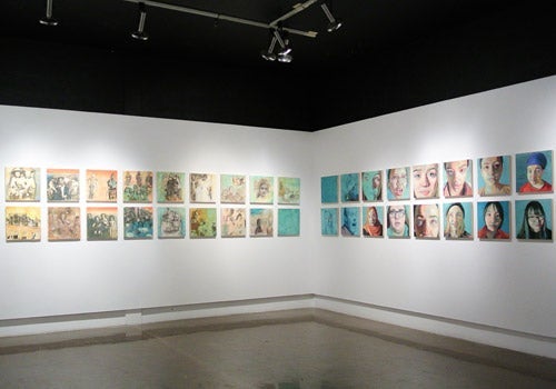 Face to Face Project painting collection in East Campus Hall Artery Gallery