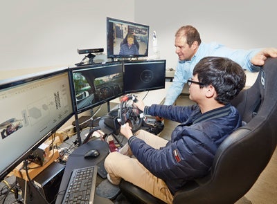 Chaojie Ou and Fakhri Karray working together on AI technology for driving