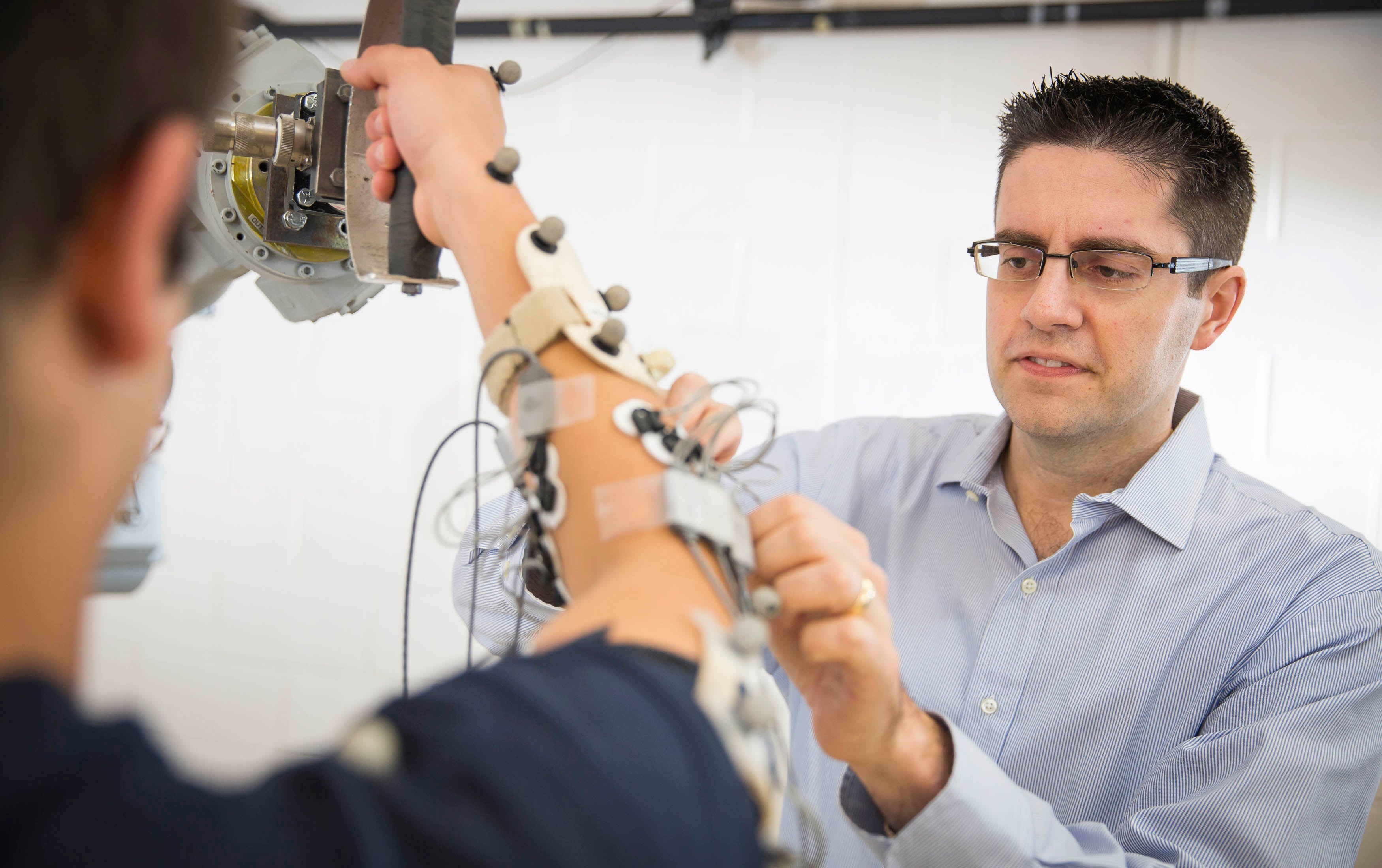 Clark Dickerson working with patient
