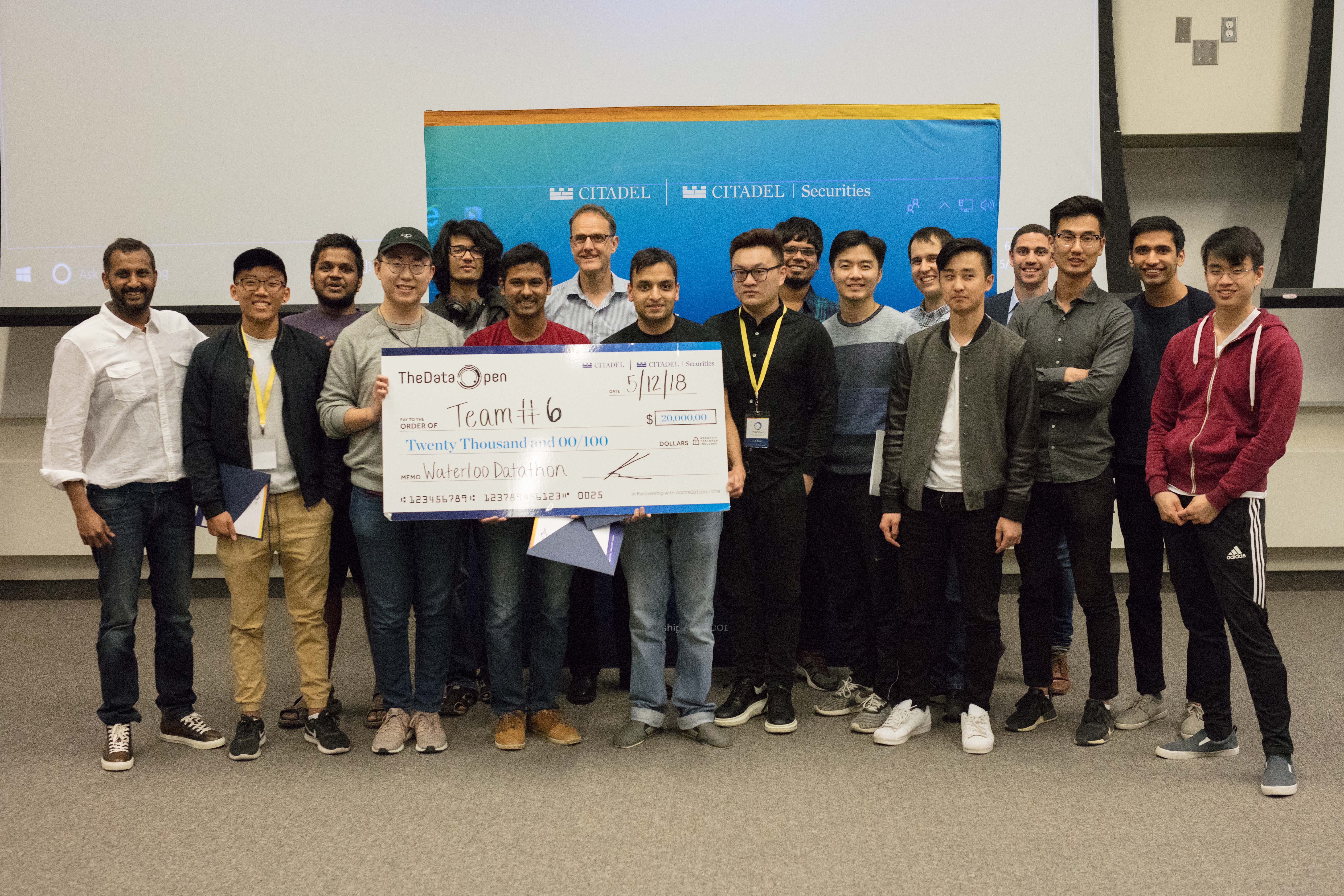 A large group of STEM students accept the prize