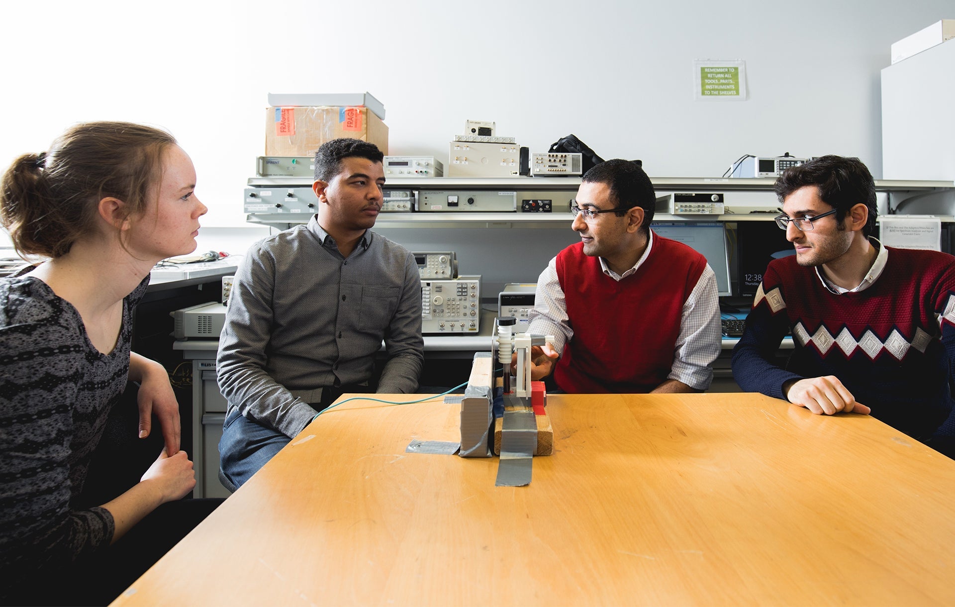 George Shaker speaks with students