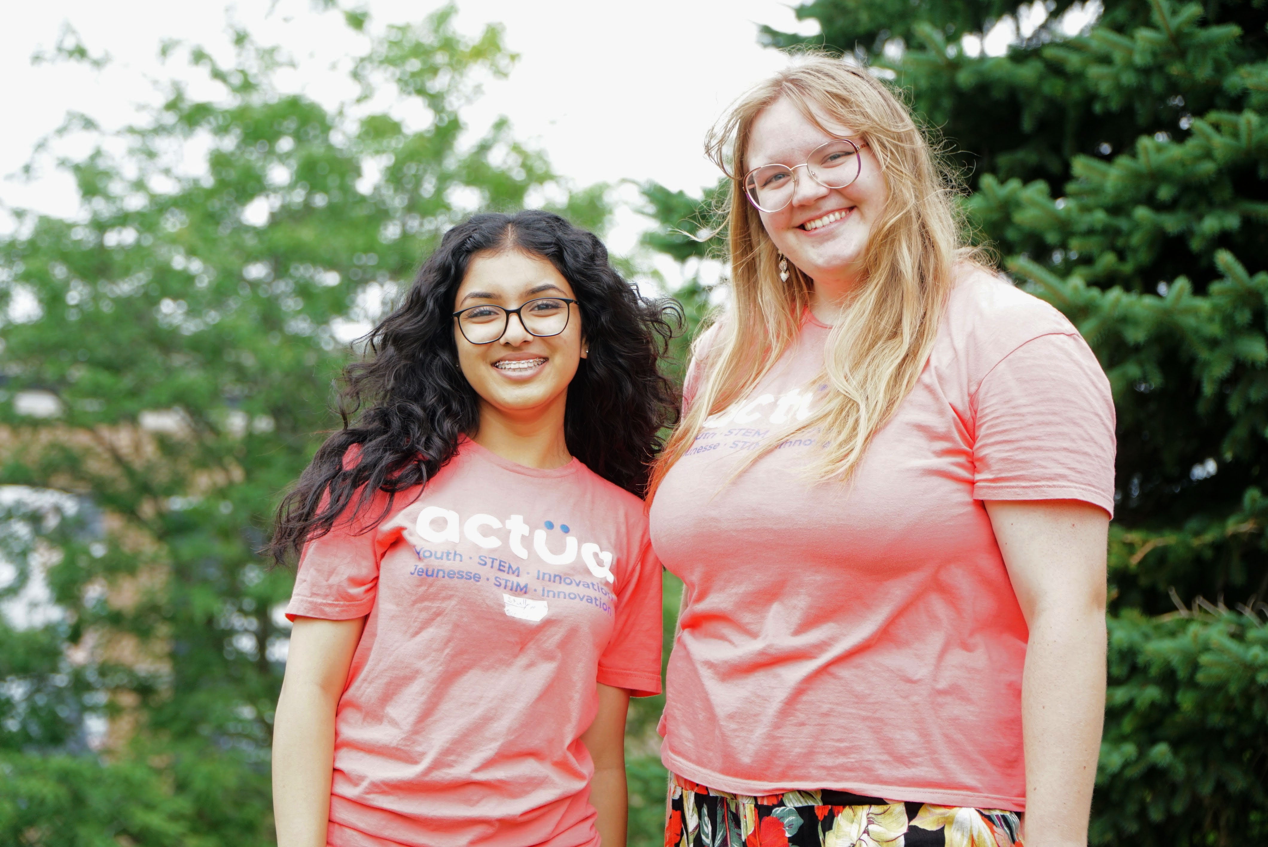 Simone Sankhe poses with another Engineering Outreach staff member.