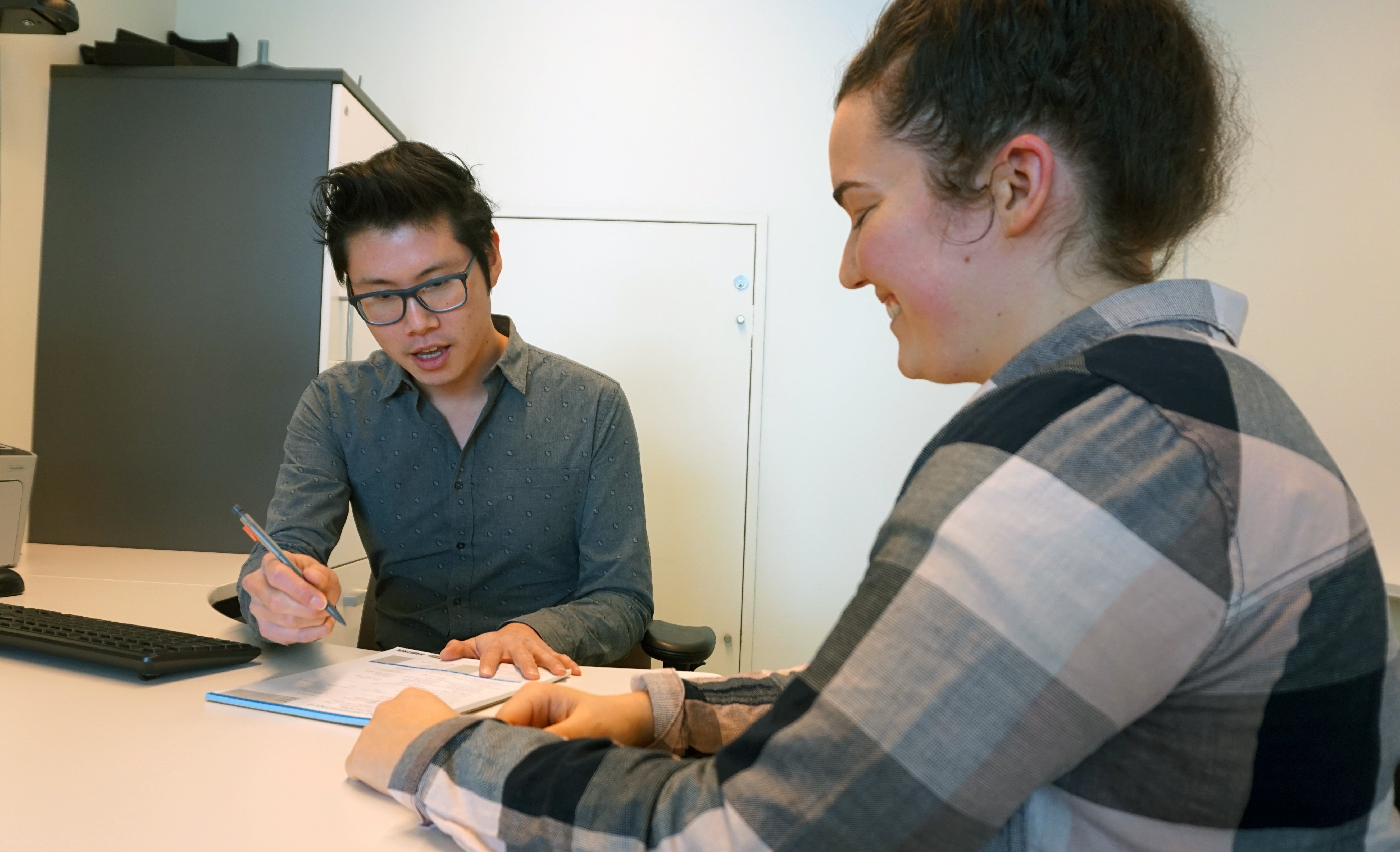 Jeff Wong works with Waterloo student