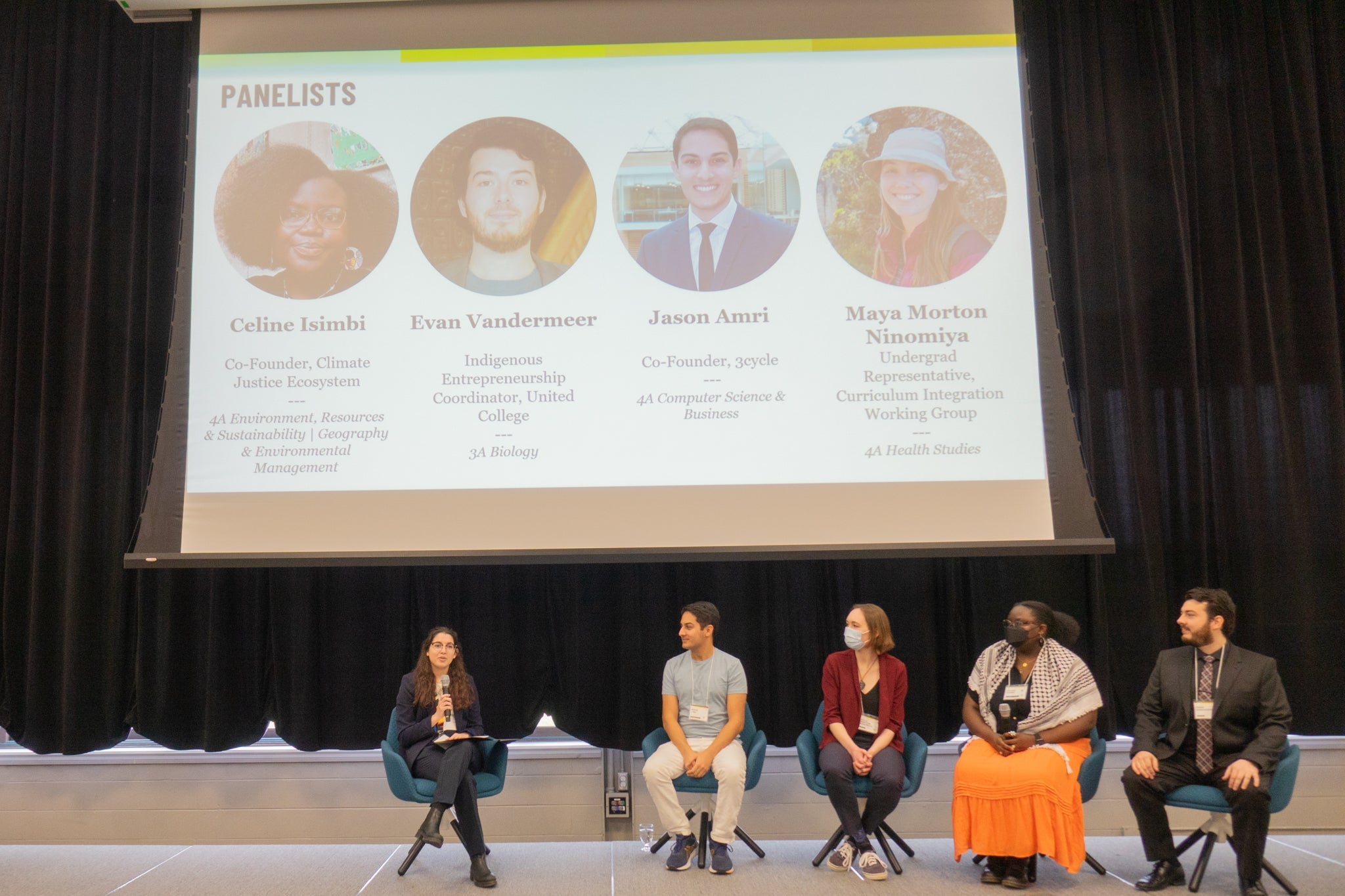 Student panelists sitting on stage