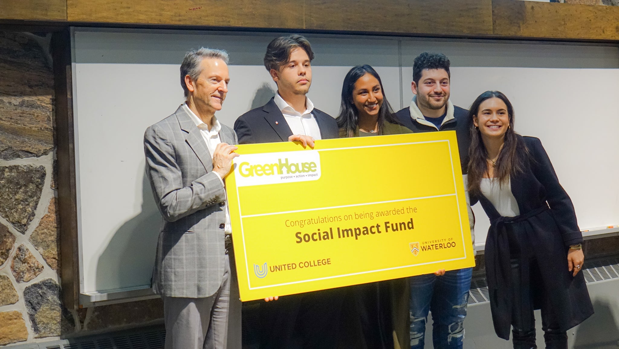 Rick Myers, principal at United College, presents Social Impact Fund to Safi co-founders