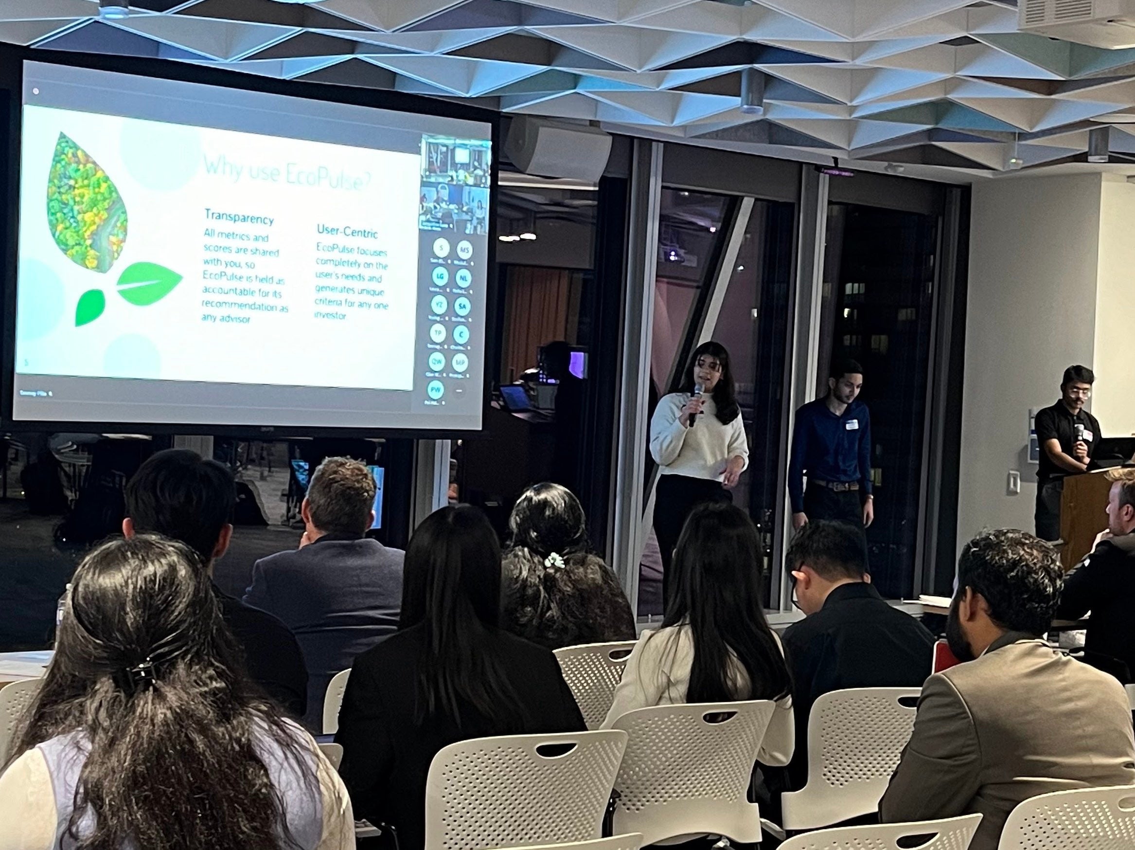 Valerie Fernandes, Tanmay Pilla and Ekanshh Praveen presenting at competition