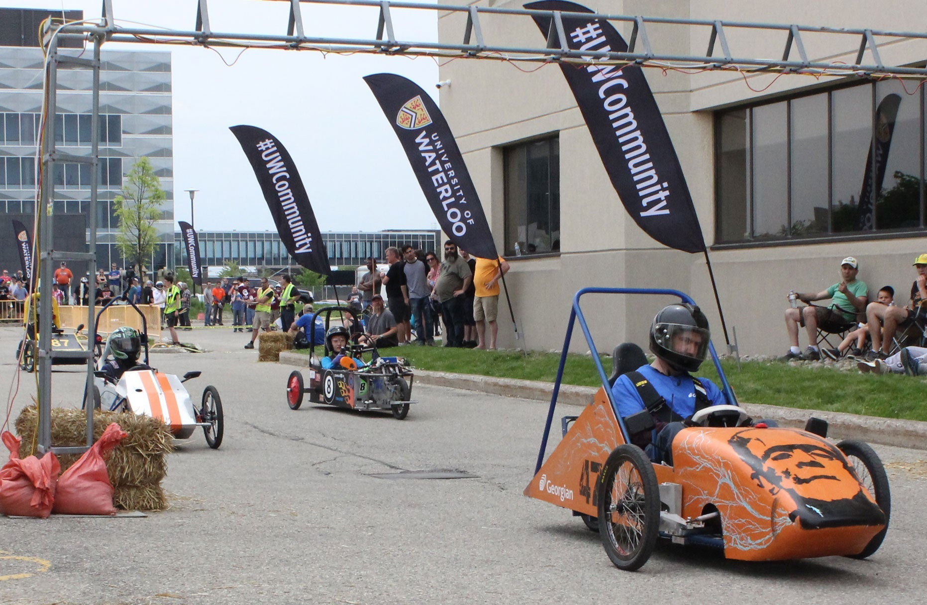 Three racers racing down the track