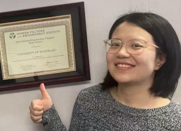Woman gives thumbs up
